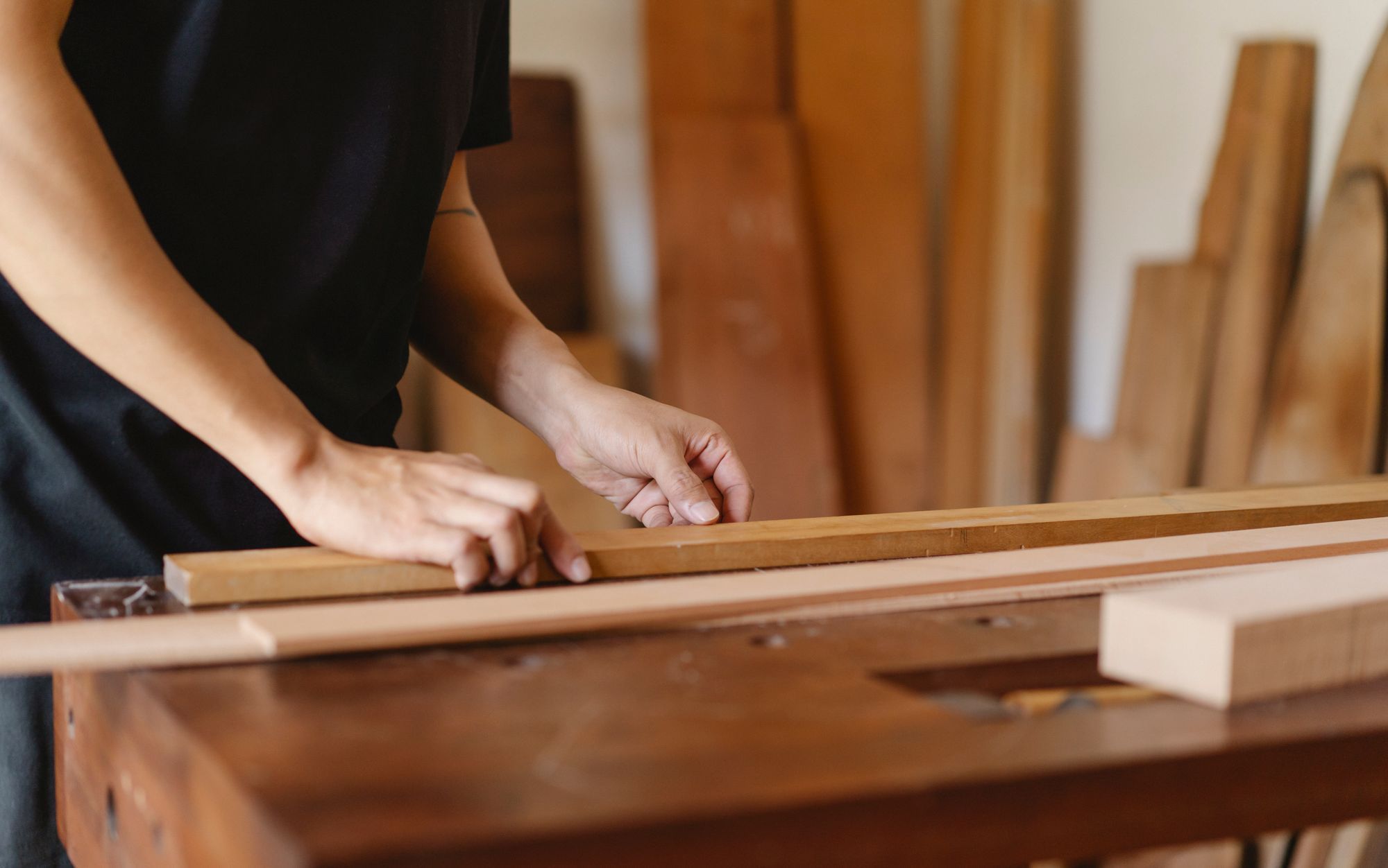 The Ashgrove team working at the bench in the Northgate workshop