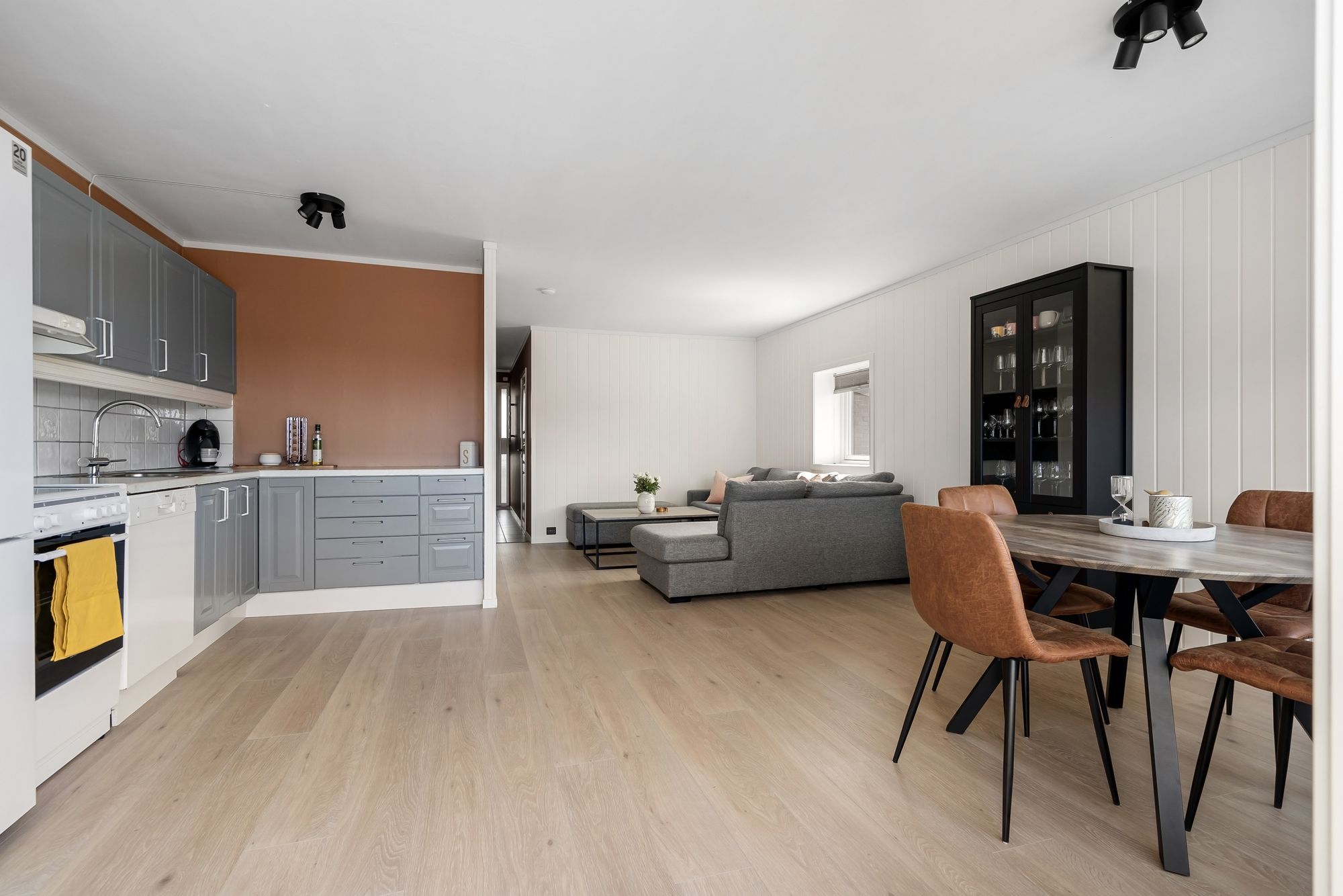 Rear extension with large sliding doors opening onto a timber deck