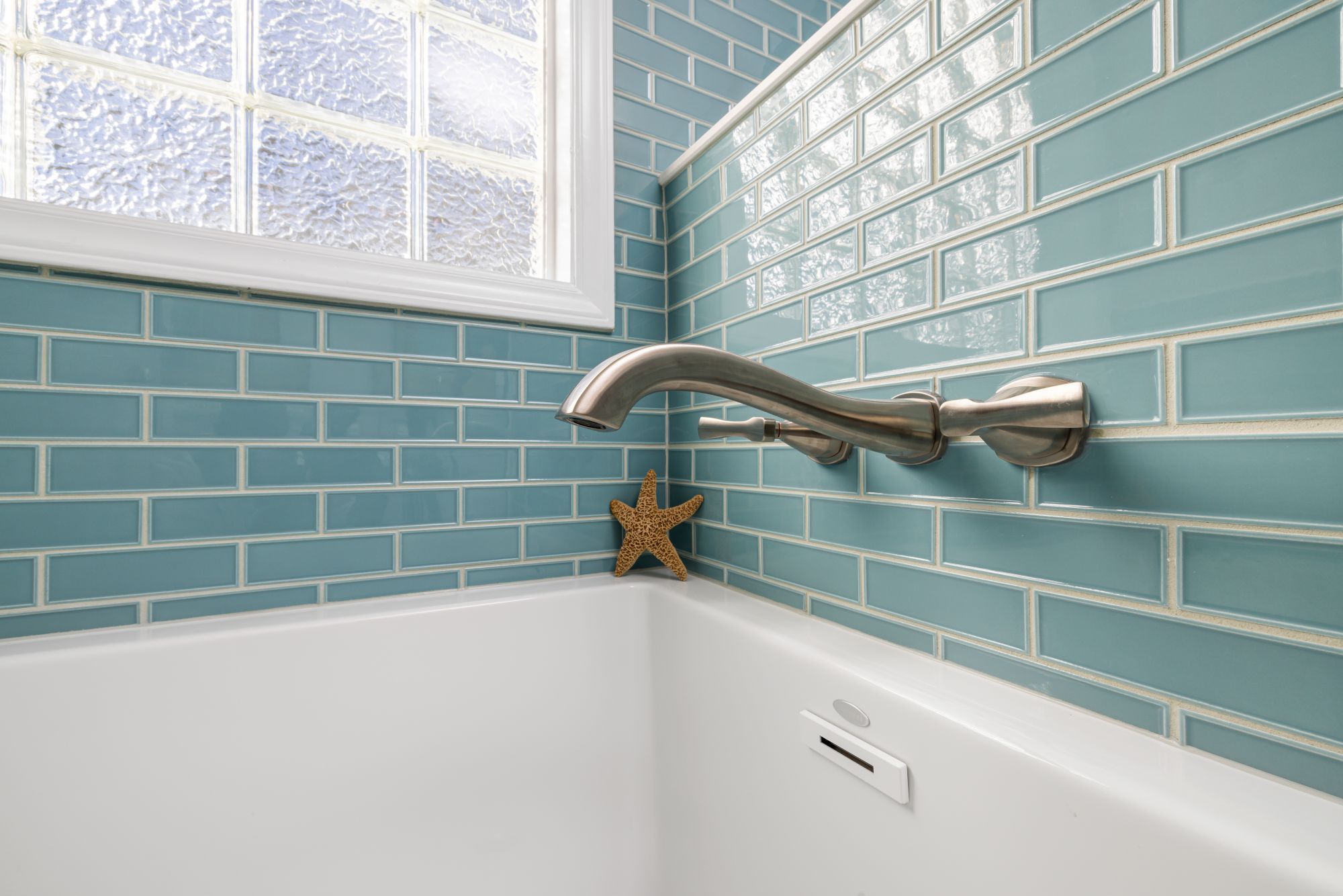 Bathroom mid-renovation with waterproofing and new tiles