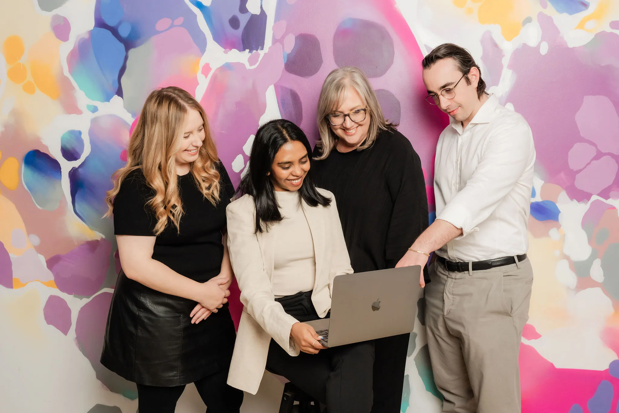 The Purple Giraffe digital team reviewing a website